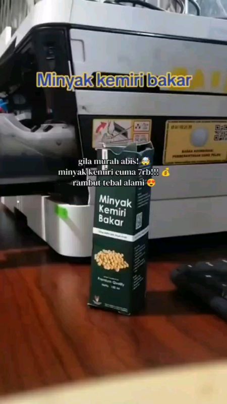 Minyak kemiri bakar 100 ml penumbuh dan menghitamkan rambut